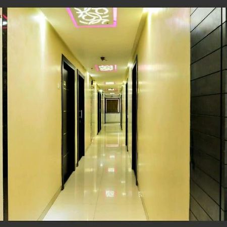 Skylawn Hotel Surat Bagian luar foto